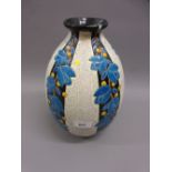 Keramis ovoid vase decorated with turquoise blue trailing flowers and black panels, interspersed