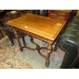 Small late 19th Century French walnut side table with a frieze drawer raised on turned tapering
