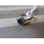 9ct White gold oval sapphire and diamond cluster ring