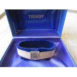 Ladies 9ct gold Tissot wristwatch with integral bracelet strap 7.25in, 27gms. There is some damage