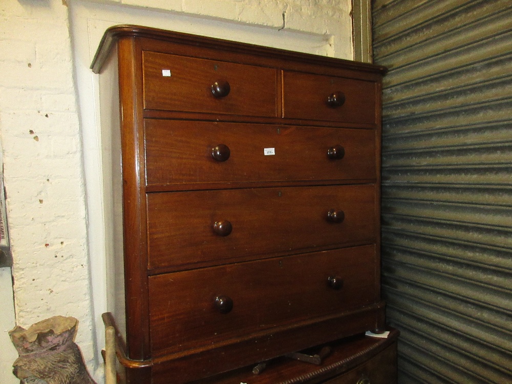 Victorian mahogany chest of two short and three long drawers with knob handles, plinth and low bun