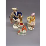 Small 19th Century Staffordshire figure of Red Riding Hood, together with two Staffordshire