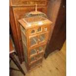 Oriental hardwood and wirework cricket cabinet having lift-off top above four drawers with knob