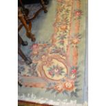 Large mid 20th Century Chinese carpet with typical embossed floral design on a cream ground with