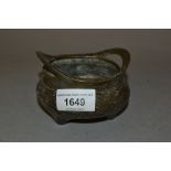 Small Chinese brown patinated bronze two handled censer, signed with seal mark to base