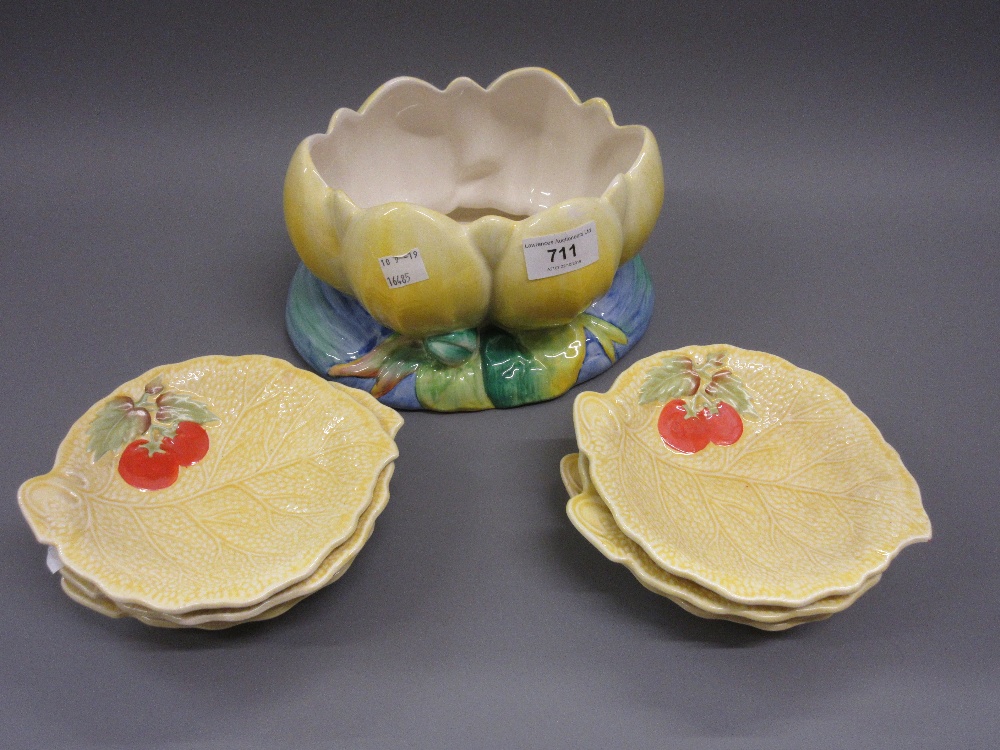 Clarice Cliff bowl in the form of a lily together with six matching leaf form dishes