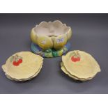 Clarice Cliff bowl in the form of a lily together with six matching leaf form dishes