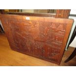 Mid 20th Century oriental carved hardwood wall plaque depicting figures in a landscape