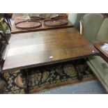 19th Century Gothic Revival oak centre table, the plank top with carved edge above pierced and