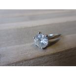 Large brilliant cut diamond solitaire ring set in white metal, approximately 2.5cts No laboratory