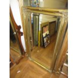 Rectangular gilt moulded composition hanging wall mirror 54ins x 30ins