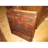 20th Century Art Nouveau style wall bracket with an arrangement of doors and drawers with carved
