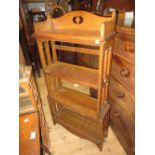 Early 20th Century Arts and Crafts four shelf open bookcase with pierced sides, stamped with