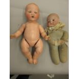 Two Armand Marseille, German bisque headed baby dolls, the heads marked 351/6K and 341/4