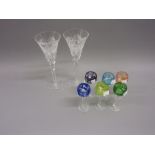 Set of six harlequin Bohemian coloured liqueur glasses and a pair of Waterford glass champagne