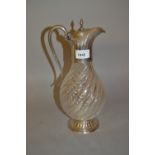 London silver mounted claret jug with a spiral fluted body, hinged lid and scroll handle