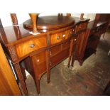 Dining room suite comprising a Serpentine three drawer serving table with fitted silver plated