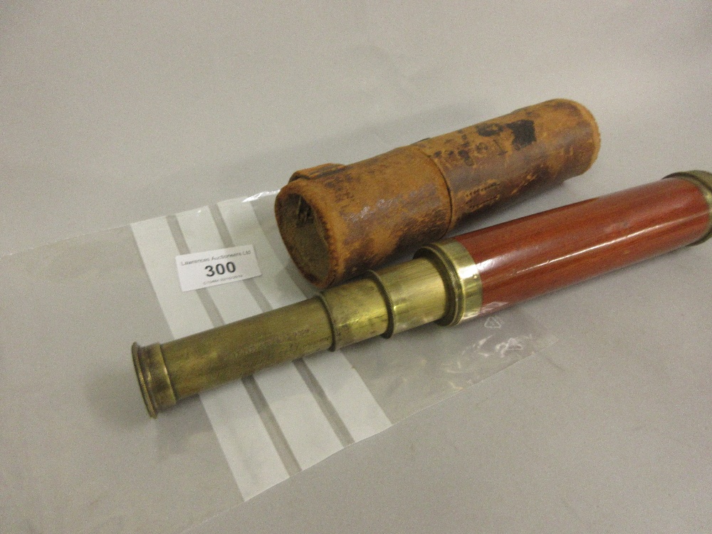 Gilbert and Sons, London, brass and mahogany three drawer telescope with leather case (case at