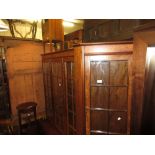 20th Century burr walnut three door bookcase, the top with glazed doors enclosing glass shelves