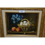 Modern oil on board, still life, basket of eggs, fruit and flowers on a ledge, 8ins x 10ins, gilt