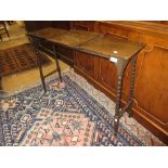 Oak reading table on bobbin turned supports together with a Victorian walnut side chair and a