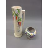 Art Deco Bewley pottery jug vase painted with flowering branches, together with a Poole Pottery