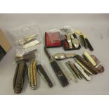 Collection of antique, vintage and modern pocket knives and penknives, including one with silver