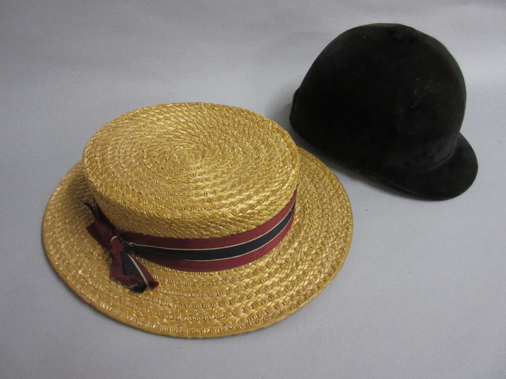 J.S. Wilson, straw boater together with a riding helmet