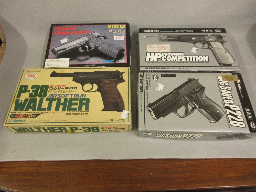 Group of four various BB pistols, Browning, Walther, Sauer and Colt