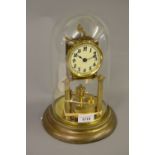 Early 20th Century brass three hundred day clock with glass display dome