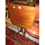 19th Century mahogany tilt top table on ring turned column with reeded supports, 19.5ins square