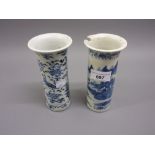 Two small Chinese blue and white cylindrical flared rim vases (at fault)