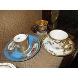 Sevres coffee can painted with a sheep and monochrome vignettes, a Vienna floral decorated and