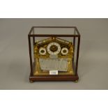 Devon Clocks England, a small reproduction brass Congreve clock Limited Edition No. 151 of 500 in