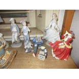 Lladro figure, ' Cinderella ', two Lladro figures of boys, a Lladro figure of a cat together with