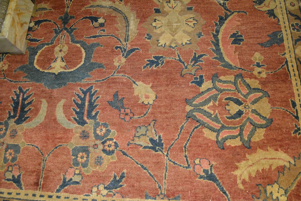 Agra carpet of all-over floral design on a burgundy ground with multiple borders, 116ins x 160ins ( - Image 3 of 4