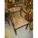 19th Century mahogany rail back open elbow chair with floral needlework drop-in seat, raised on