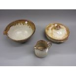 Michael Leach Yelland pottery two handled dish and cover, a bowl and a small jug (handle restored)