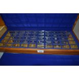 Cased set of fifty sterling silver ingots bearing the crests of major World banks