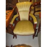 Late Victorian walnut green upholstered tub shaped chair on turned tapering front supports