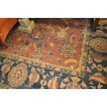Agra carpet of all-over floral design on a burgundy ground with multiple borders, 116ins x 160ins (