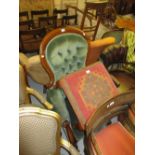 19th Century spoon back button upholstered armchair on shaped front supports with castors (at fault)