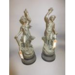 Two spelter figures inscribed ' Travail ' and ' Agriculture ' (one at fault)