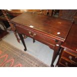 Small George III mahogany rectangular fold-over tea table with a single drawer on tapering