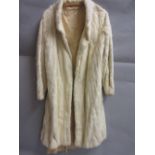 Ladies white ermine three quarter length fur coat (at fault)