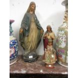 Large painted plaster figure of the Madonna, another smaller of Christ and another smaller of a