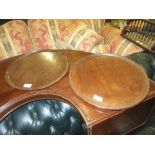 Two 19th Century turned mahogany circular trays