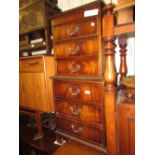 Reproduction mahogany narrow chest of six drawers on bracket feet