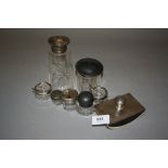 Silver mounted blotter together with a quantity of silver mounted glass bottles and salts