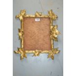 19th Century Florentine design carved giltwood frame having carved vine leaf decoration, aperture